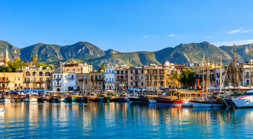 Kyrenia Girne harbour and mountains in Northern Cyprus